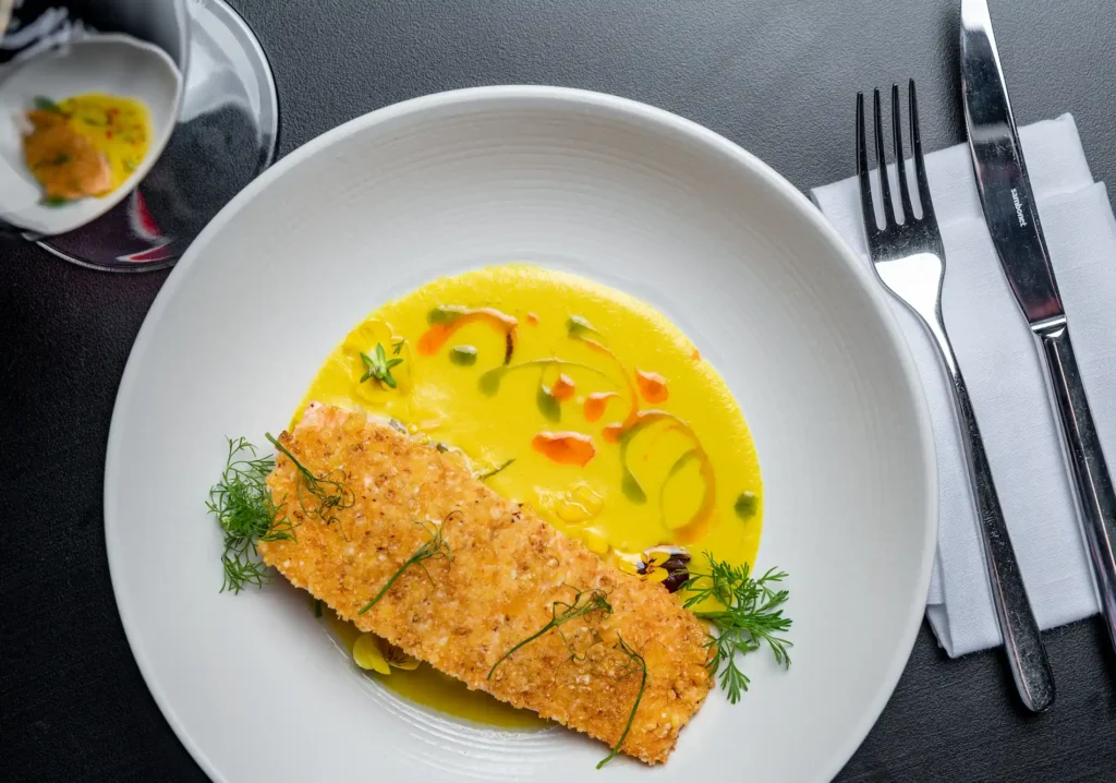 Exquisitely plated dish at Chaya, a perfect blend of artistry and gourmet flavors