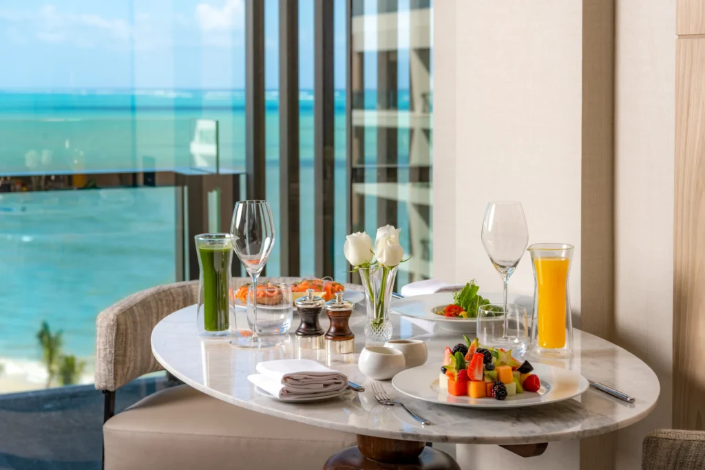 Elegant in-room breakfast with ocean view at Waldorf Astoria Cancun – A luxurious start to your day in the comfort of your suite