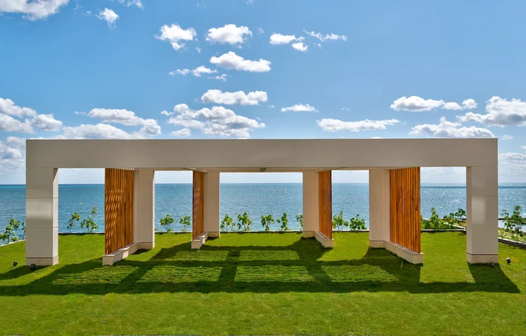 Elegant wedding pavilion surrounded by lush greenery, perfect for outdoor ceremonies.