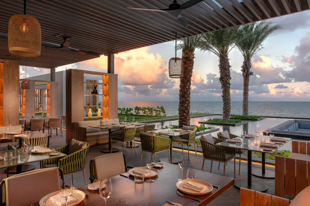 Malpeque restaurant terrace at Waldorf Astoria Cancún with stunning ocean views