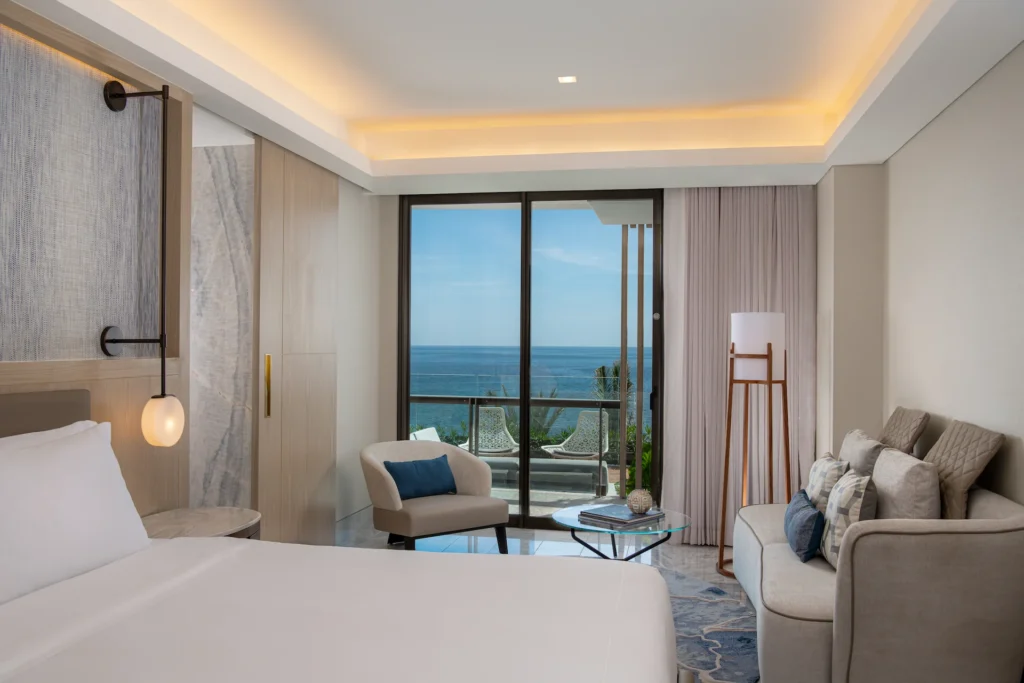Bedroom with stunning ocean views in the OCEANFRONT 2 BEDROOM PRESIDENTIAL SUITE, offering elegant décor, a king-sized bed, and a peaceful, luxurious atmosphere