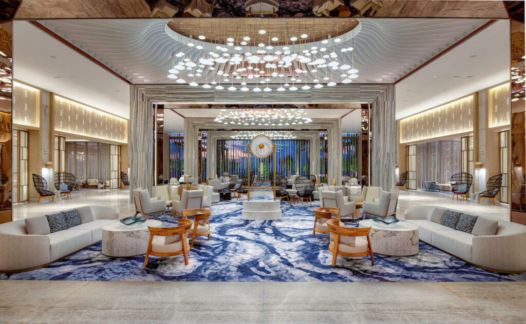 Stylish hotel lobby with modern furnishings, warm lighting, and a welcoming atmosphere
