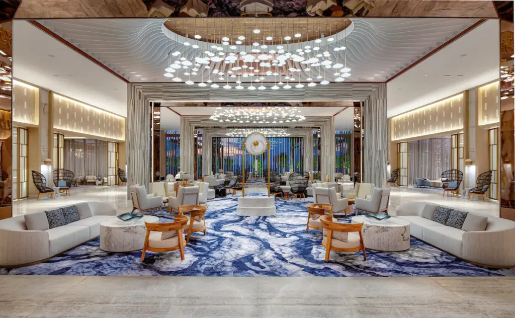 Stylish hotel lobby with modern furnishings, warm lighting, and a welcoming atmosphere