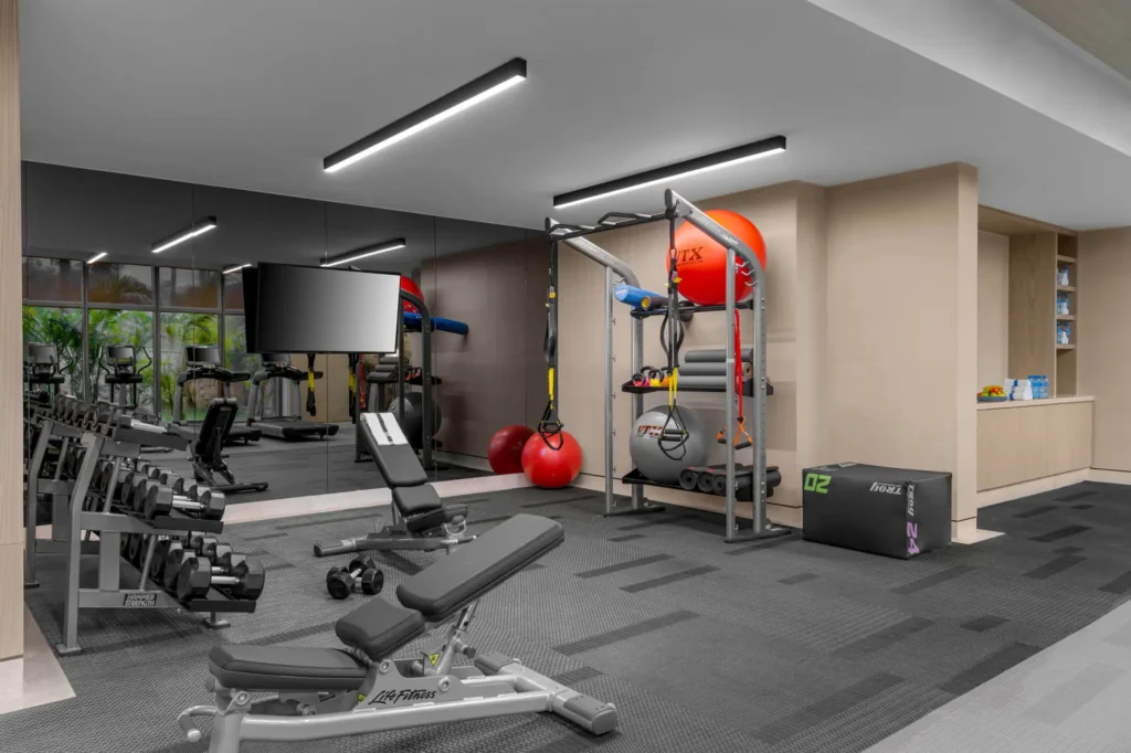 Gym at Waldorf Astoria Cancún with modern equipment